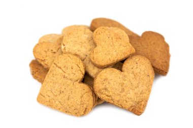 Ev yapımı kahverengi kurabiyeler kalp zencefilli ekmeği sever.