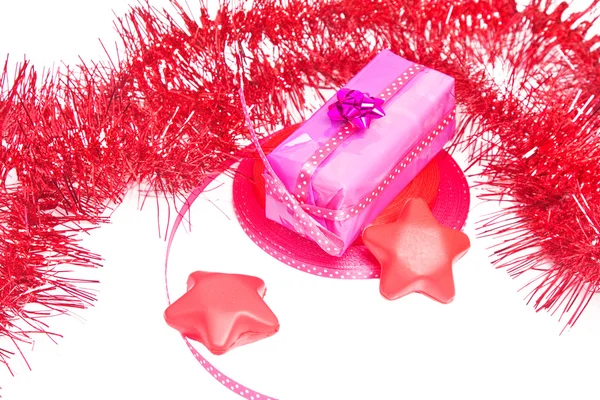 Wrapped gift with decorations — Stock Photo, Image