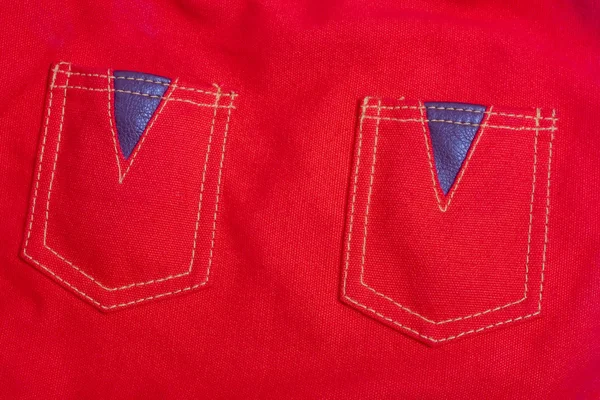 Дві кишені червоної тканини — стокове фото