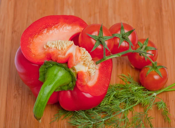 Vegetable ingredients on wooden surface — Stock Photo, Image