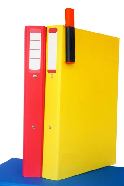 Red and yellow folders on a blue one — Stock Photo, Image