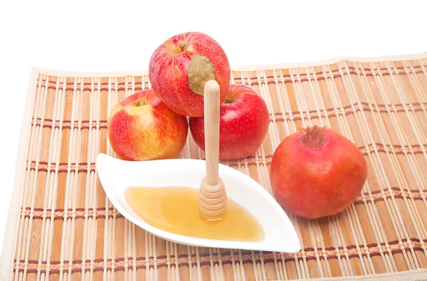 Honey dipper with pomegranate — Stock Photo, Image