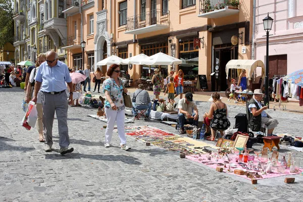 Elderly men and women walking around Holiday Fair — Stock Photo, Image