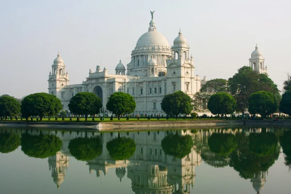 Reflection of the white building Victoria Memorial in Kolkata