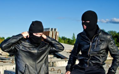 Two criminals getting ready for robbery clipart