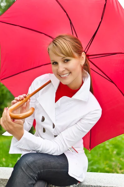 Portrait of pretty woman with umbrella — Stock Photo, Image