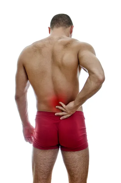 Вид сзади на мускулистого человека с болью в спине. Изолированные на белом . — стоковое фото