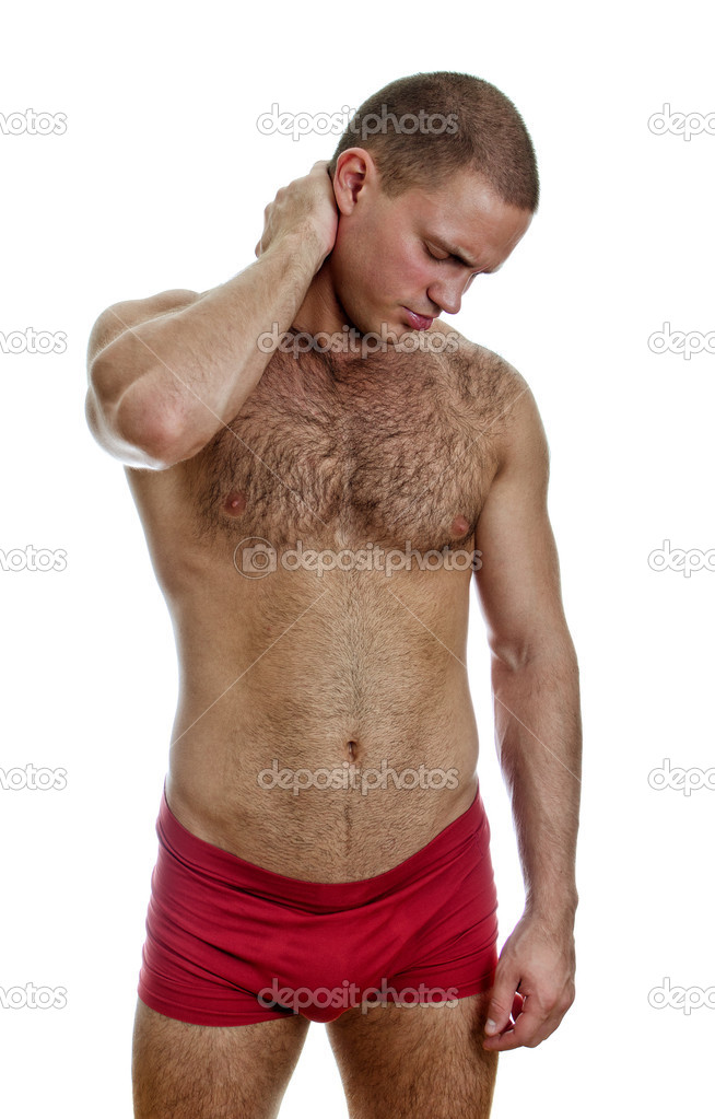 Front view of muscular man with neck pain. Isolated on white.