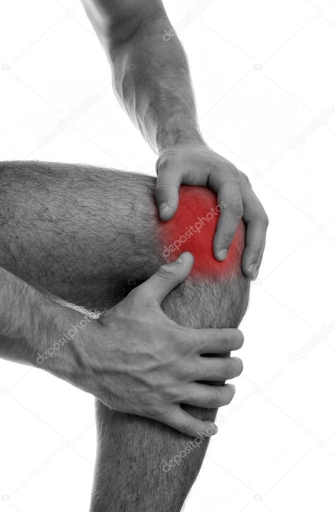 Close up view of male hands holding his sore knee. Isolated on white. black