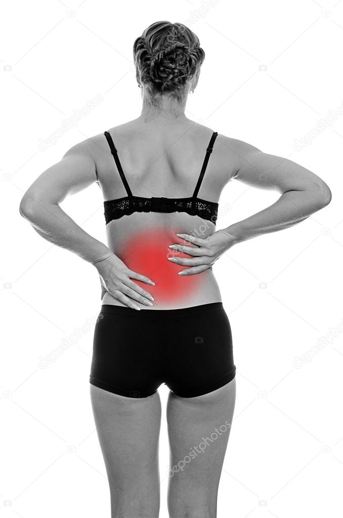 Rear view of young woman with spinal pain. Isolated on white. Black and white