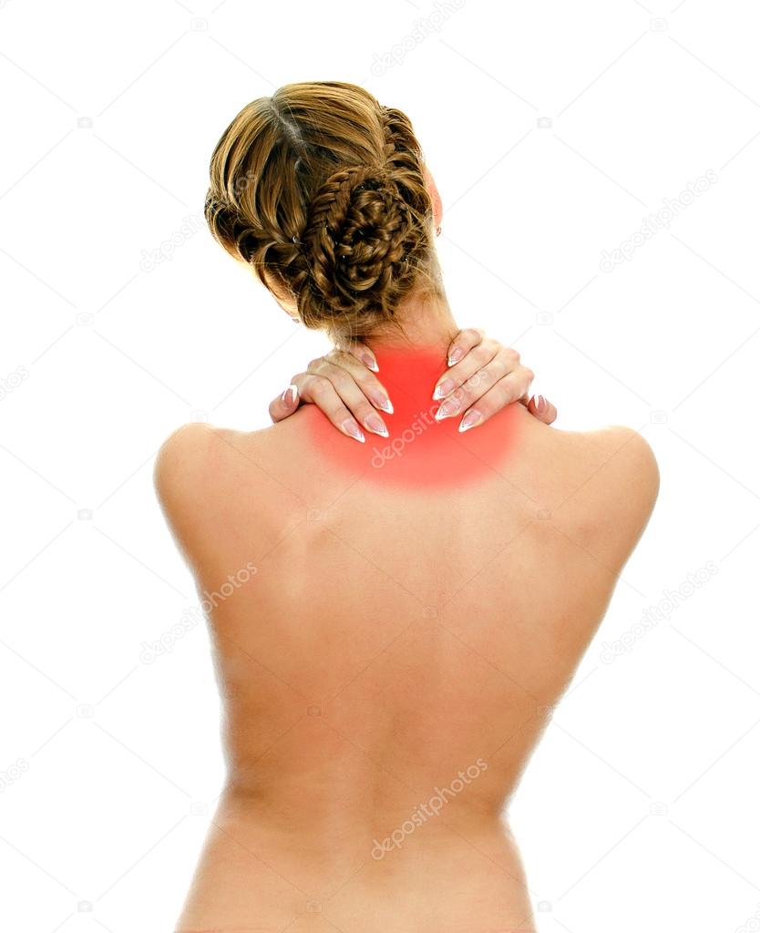 Rear view of young woman with neck pain. Isolated on white. Stock Photo