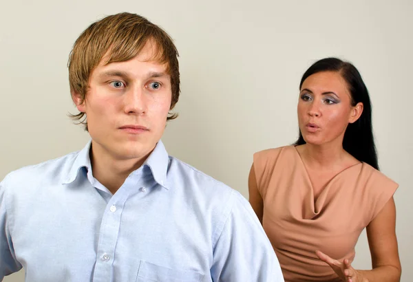 Young couple quarreling. Man in a rage — Stock Photo, Image