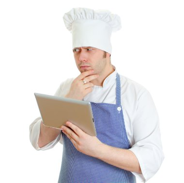 tablet pc kullanma yakışıklı şef aşçı. beyaz izole