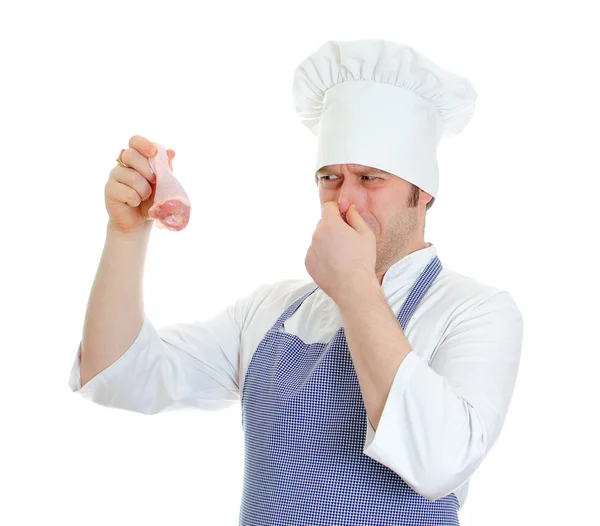 Chefe cozinheiro segurando perna de frango podre. Isolado em branco — Fotografia de Stock