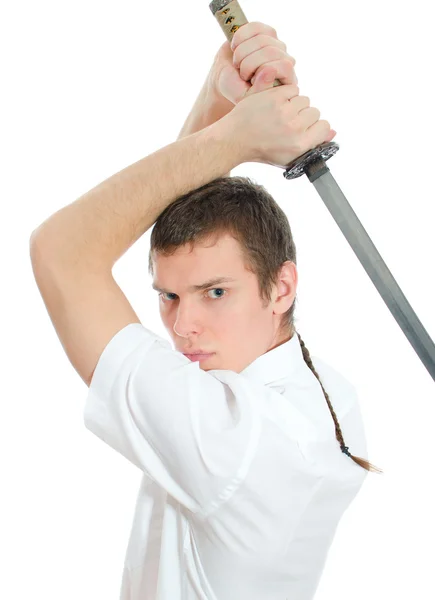 Un joven amenazando con una espada. Aislado sobre blanco —  Fotos de Stock