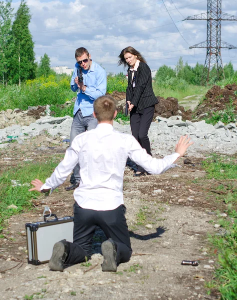 Two FBI agents conduct arrest of an offender with the gun — Stock Photo, Image