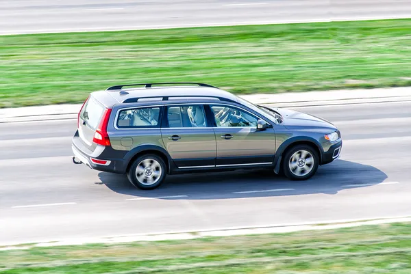 Family car driving on asphalt road — Stock Photo, Image