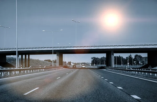 Highway perspective on a sky background — Stock Photo, Image