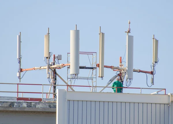 Six cellular towers on the roof — Stock Photo, Image