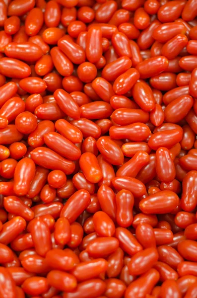 Lots of red tomatoes in supermarket — Stock Photo, Image