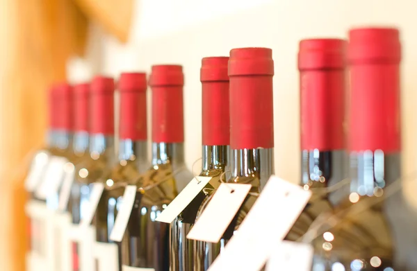 Bottles of red wine in the store — Stock Photo, Image