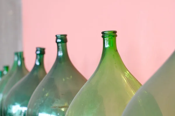 Old green bottles for wine making. — Stock Photo, Image