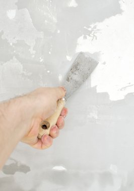 Erkek el tamirat duvar spackling Yapıştır