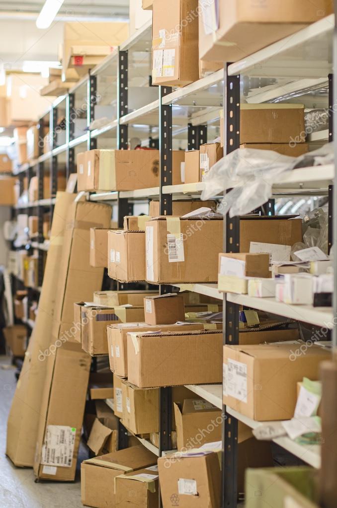 Shelves with parcels in the post office. Stock Photo by ©mproduction