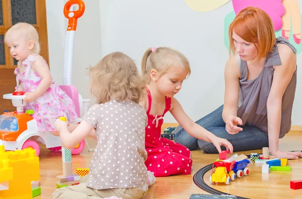 Kids playing in kindergarten. — Stock Photo, Image