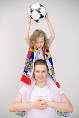 Baba ve kızı destekler spor takım.