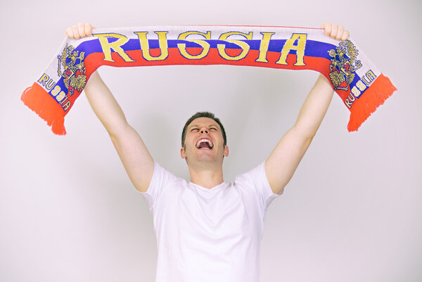 Man supports Russian team with Russian scarf.