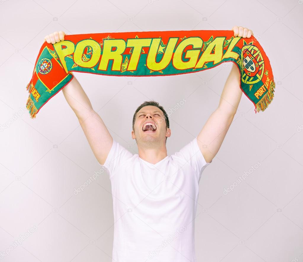 Man supports Portugal team with Portuguese scarf.