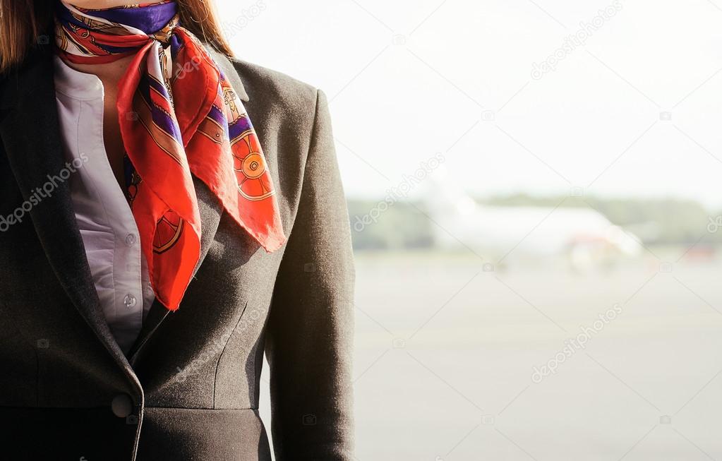 Stewardess on the airfield. Place for your text.