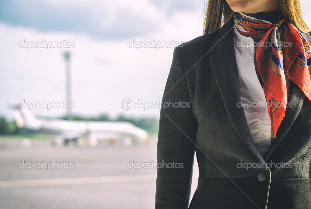 Stewardess on the airfield. Place for your text.