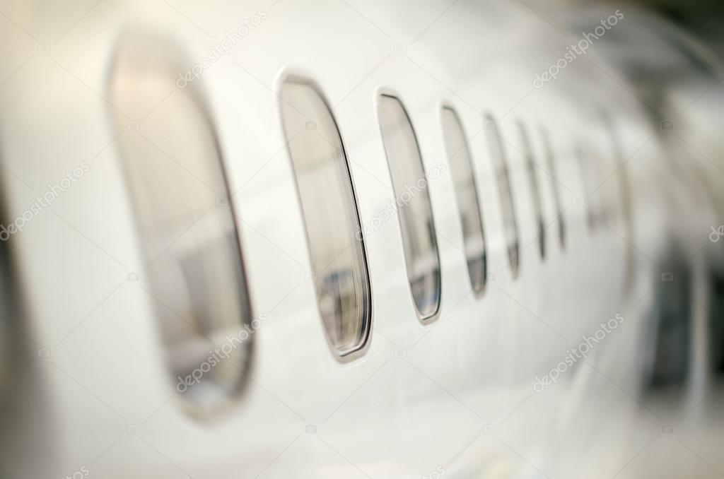 Passenger aircraft windows. View from outside.