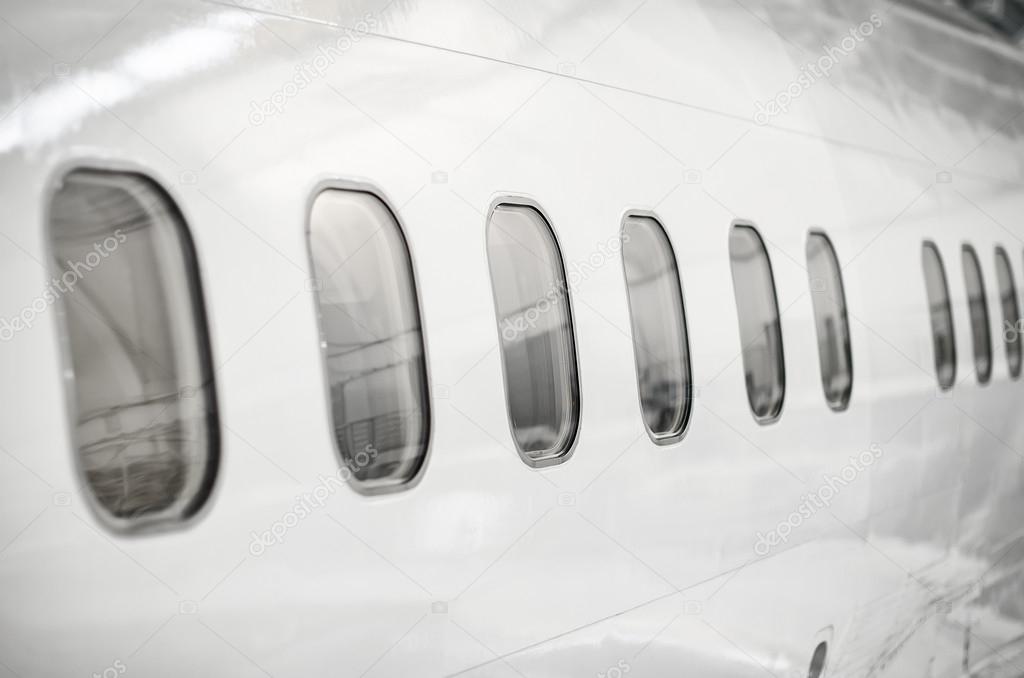 Passenger aircraft windows. View from outside.