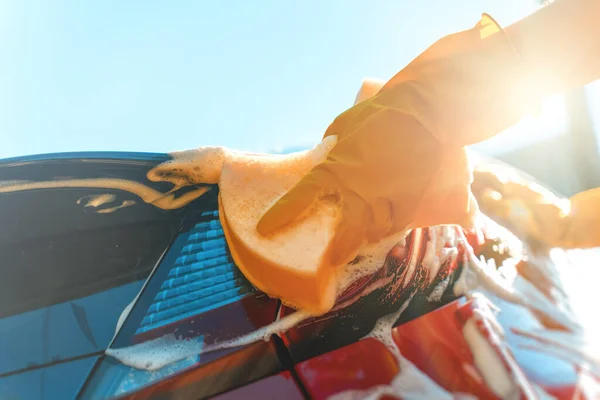 Woman Gloves Washes Car Back Light Sponge — Stock Photo, Image