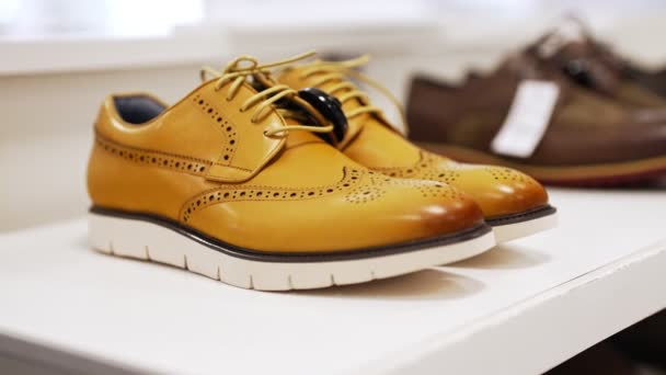 Mustard Colored Leather Men Boots Shoe Store — Stock Video