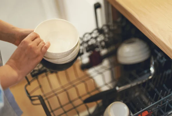 Woman Unloads Dishes Dishwasher — Stock Photo, Image