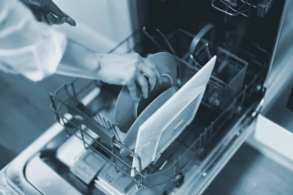 Woman Loads Dishes Dishwasher — Stock Photo, Image