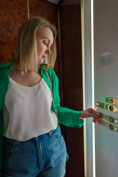 Woman Pressing Button Elevator — Stock Photo, Image