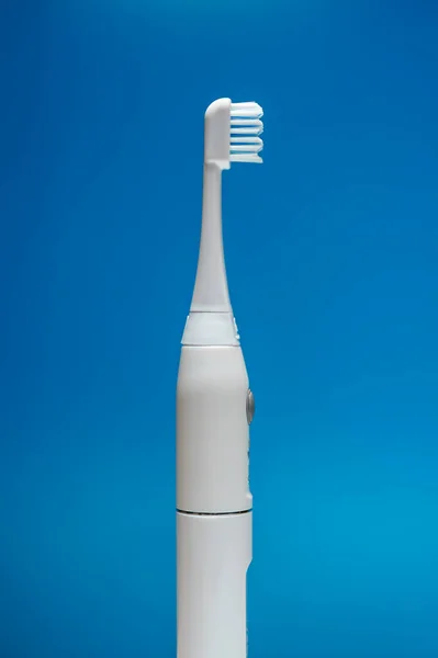 Electric Ultrasonic Toothbrush Blue Background — Stock Photo, Image