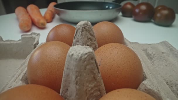 Packaging Raw Eggs Kitchen Table — Vídeo de stock