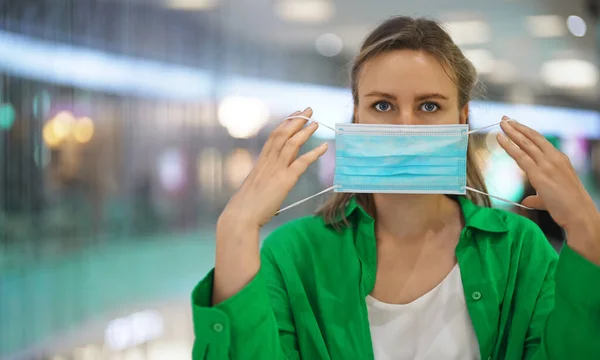 Woman Putting Medical Mask Mall Wear Mask Public Place — Stock Photo, Image