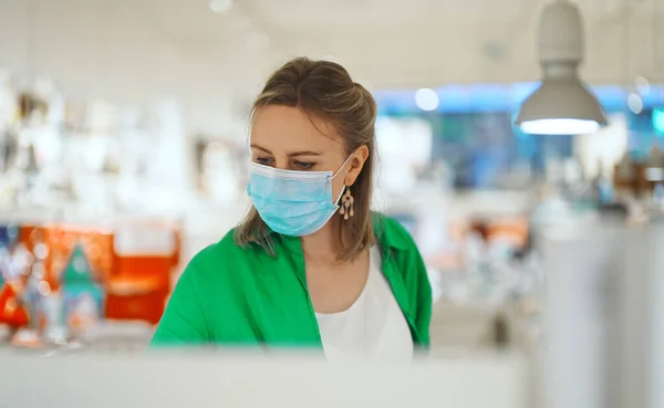 Woman Medical Mask Chooses Gift Toy Store — Stock Photo, Image