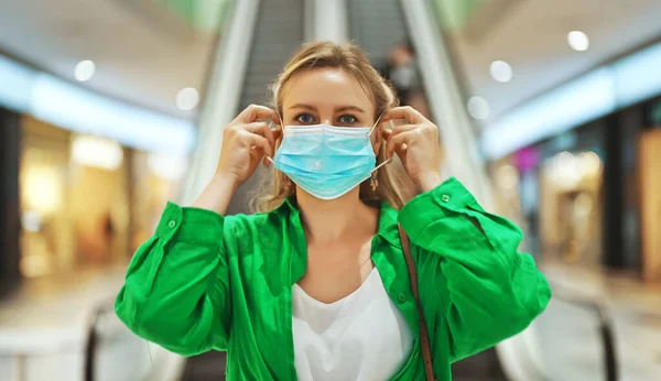 Woman Putting Medical Mask Mall Wear Mask Public Place — Stock Photo, Image