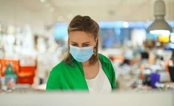 Woman Medical Mask Chooses Gift Toy Store — Stock Photo, Image