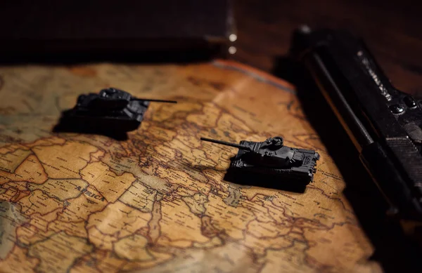 Toy tanks on the map. Military operations in Ukraine.