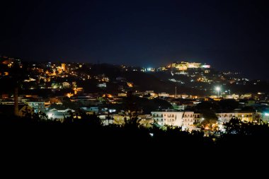 Night view of the city of Scauri in Italy.