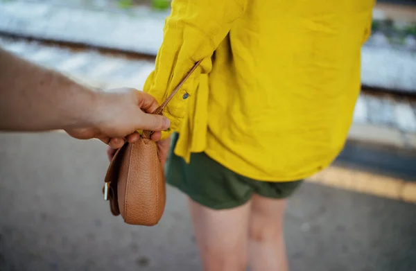 Thief Robs Woman Handbag Train Station — стоковое фото